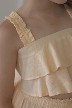 Aurelia Sleeveless Flounce Top in tender peach