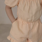 Edith Cold Shoulder Playsuit in tender peach